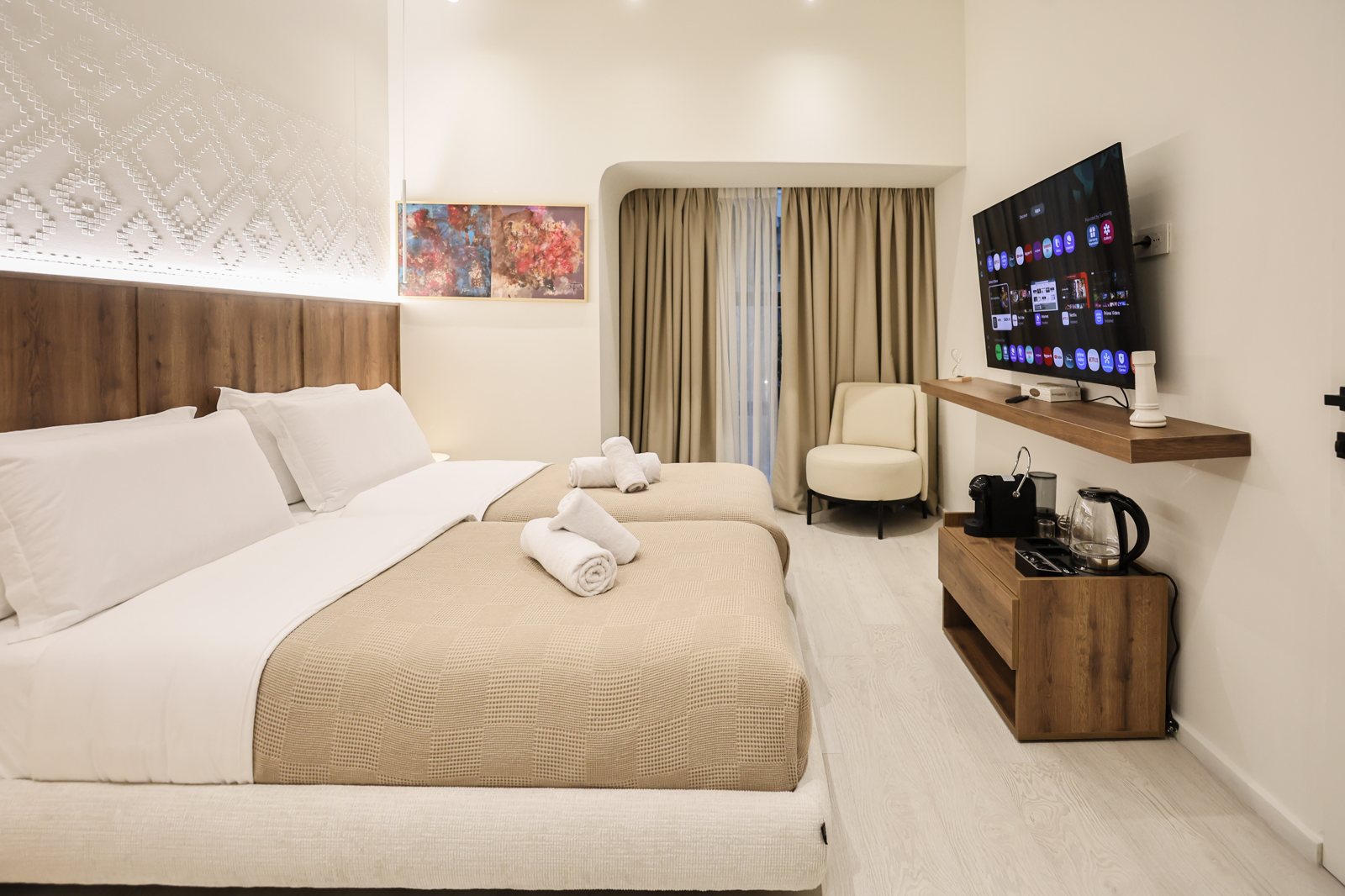 Spacious room with sofa and artwork